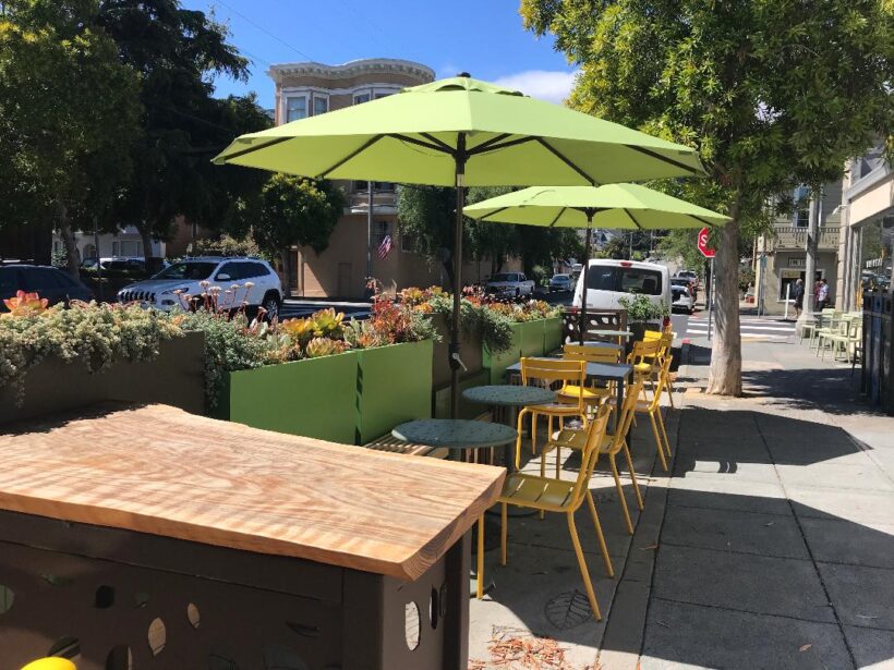 Driver’s Market sidewalk parklet, neighboring buildings and Caledonia Street