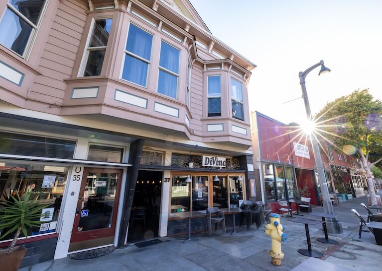 Notte Divino’s Victorian building and sidewalk dining on Caledonia Street
