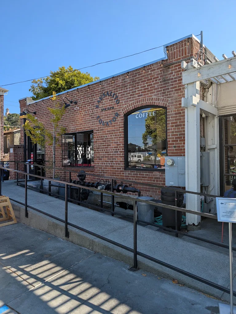 Equator Coffee brick storefront and sidewalk